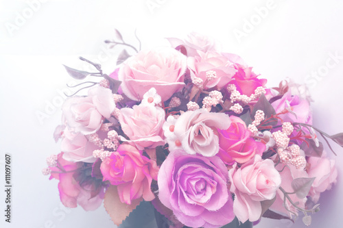 Beautiful artificial flowers. artificial rose in vintage color style. © NinelittlePhoto