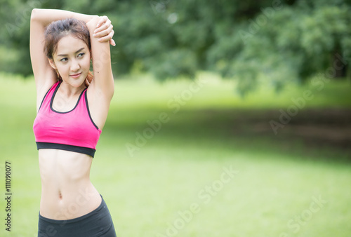 beautiful asian woman exercising in the park