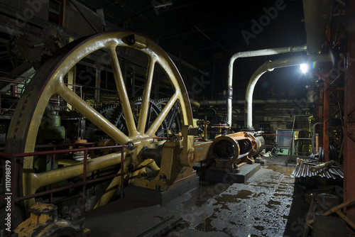 Giant flywheel in old colonial factory