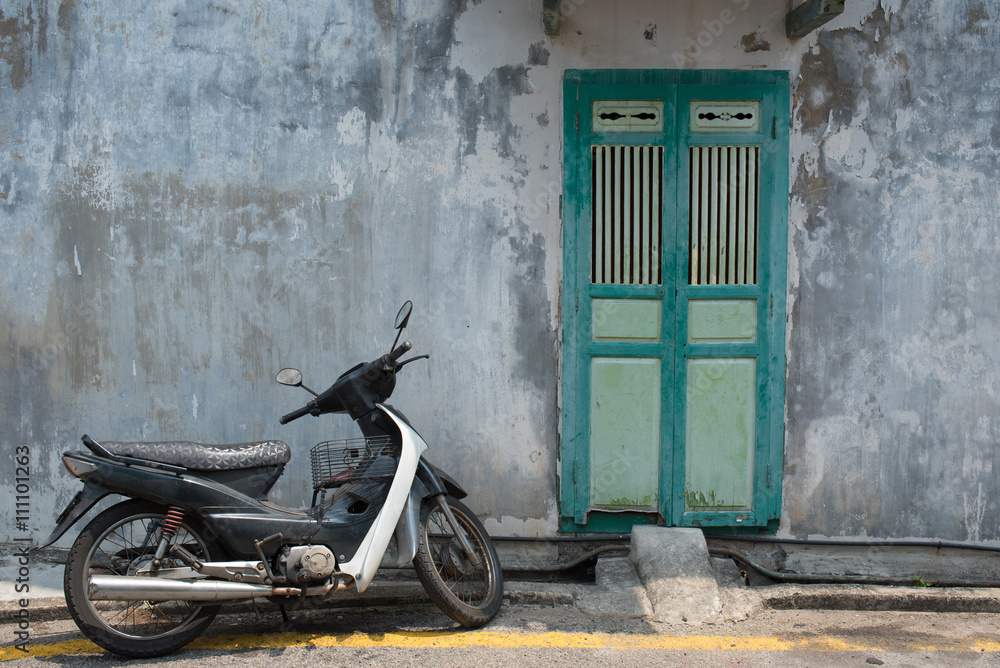 Old door and bike in Georgetown, Penang, Malaysia