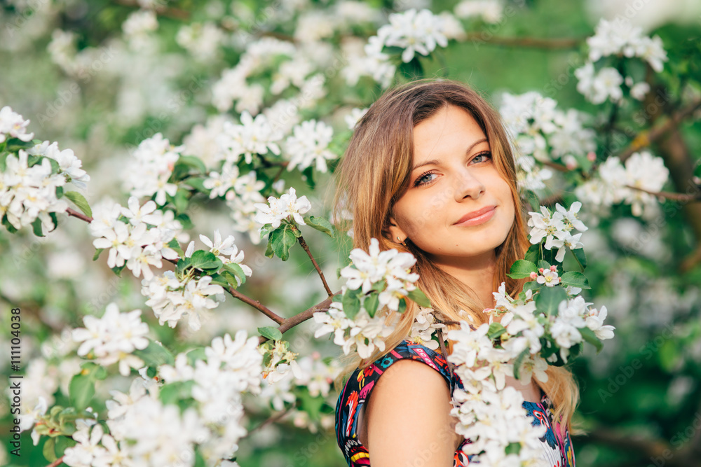 Beautiful woman in blooming garden Beautiful woman in blooming garden