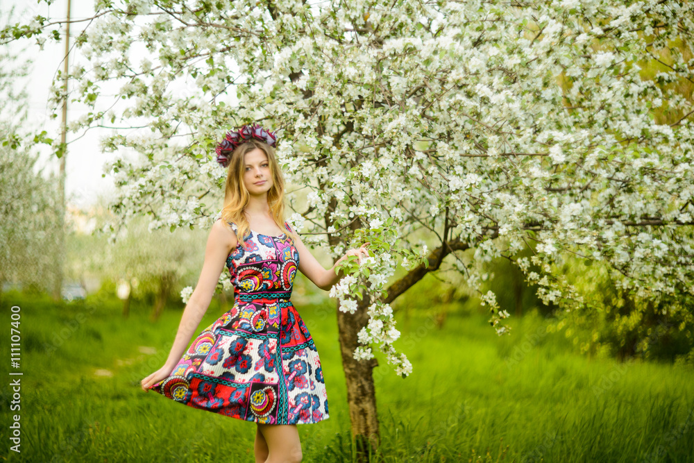 Beautiful woman in blooming garden Beautiful woman in blooming garden