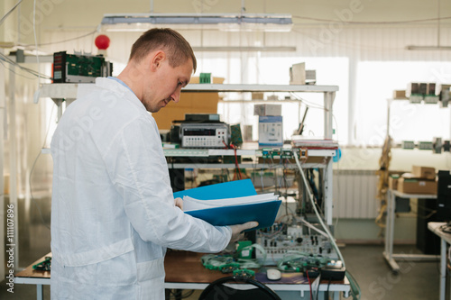Microchip production factory. Computer expert  