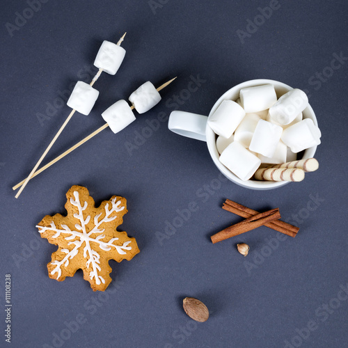 composition with cookies, marshmallow dessert and cinnamon