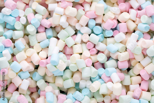 Background or texture of colorful mini marshmallows. © gitusik