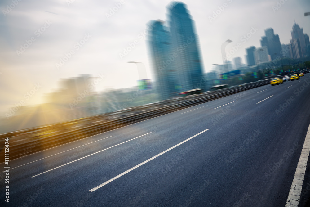 motion traffic on highway wity city background,chongqing china. motion traffic on highway wity city background,chongqing china.