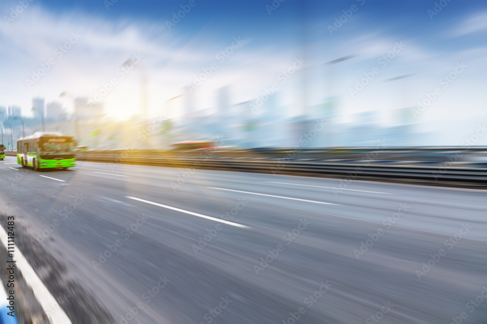 Fototapeta premium motion traffic on highway wity city background，chongqing china.