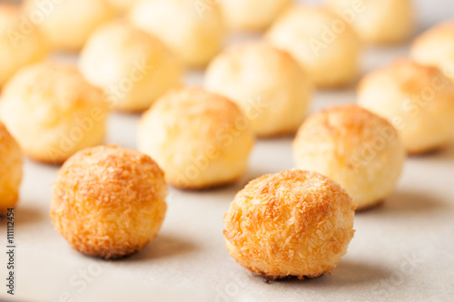 Fresh homemade coconut cookies on parchment paper