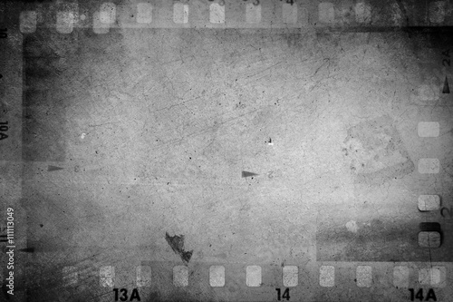 Gray film strip frames negatives textured background