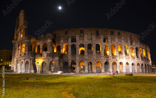 The Colosseum at moon night. Rome. Italy