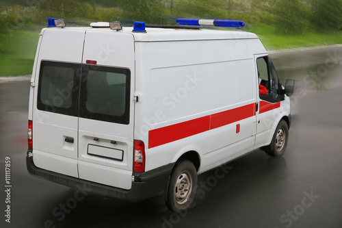 Fototapeta Naklejka Na Ścianę i Meble -   ambulance on  parking near hospital