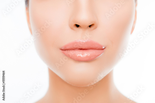 Close up photo of woman s face with perfect skin and lips
