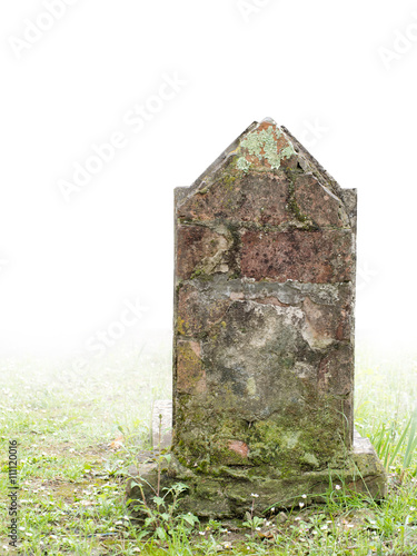 Old gravestone, fog fades to white background, no wording.