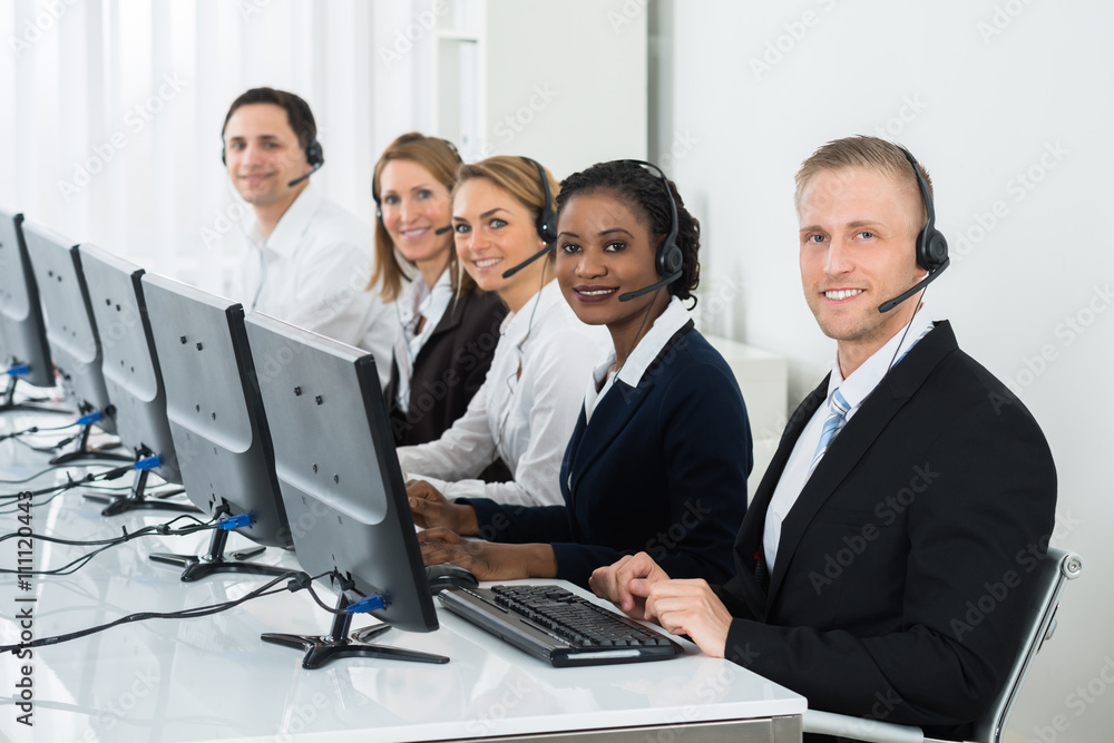 Businesspeople Working In Call Center Businesspeople Working In Call Center