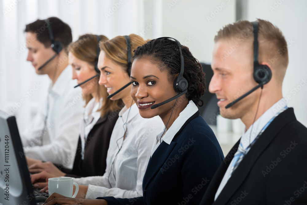 Businesswoman Working With Other Colleagues In Call Center