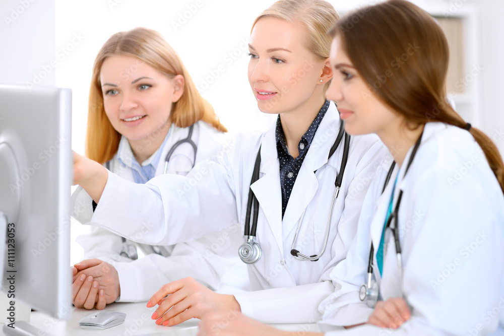 Female doctor leading a medical team at the hospital Female doctor leading a medical team at the hospital