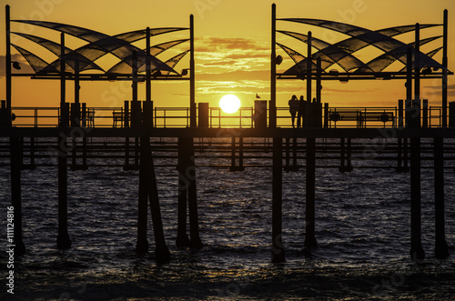 Watching the Sunset. This is an image of a couple watching the sunset from the Redondo Beach Pier.