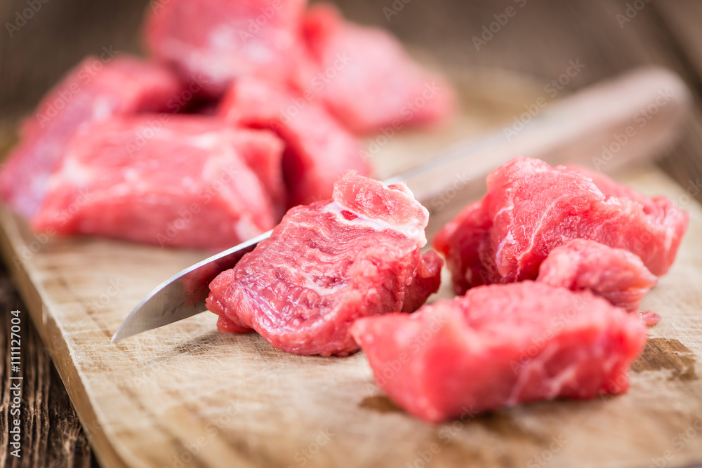 Wooden table with Chopped Beef fillet