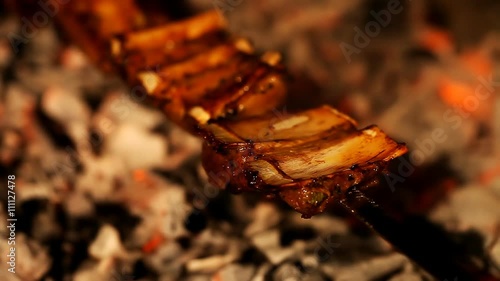Juicy slices of ribs cooked in the grill  /  Juicy slices of ribs cooked in the grill Full HD