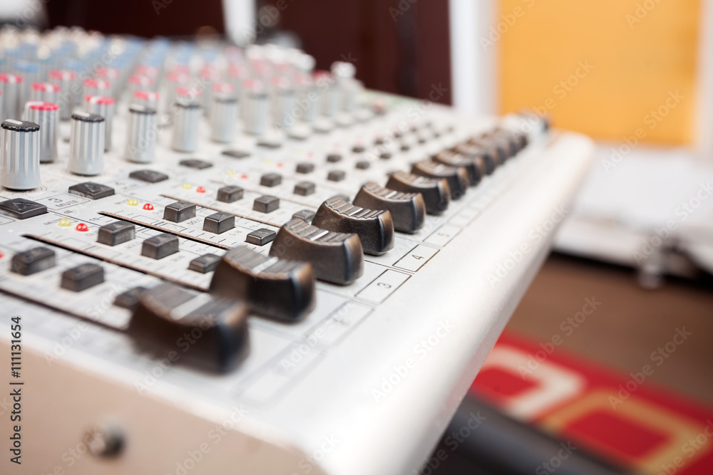 Buttons On Gray Music Mixer In Recording Studio Buttons On Gray Music Mixer In Recording Studio