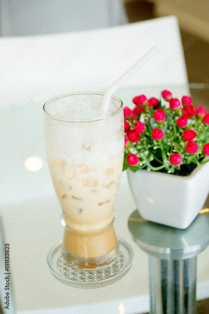 Ice coffee on the table glass. Ice coffee on the table glass.