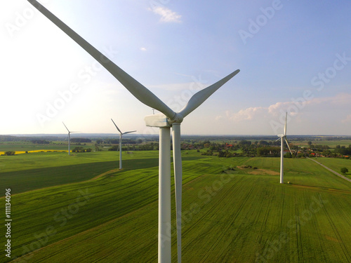 aerial view of a wind turbine in a agriculture field