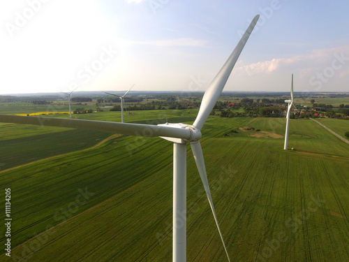 aerial view of a wind turbine in a agriculture field