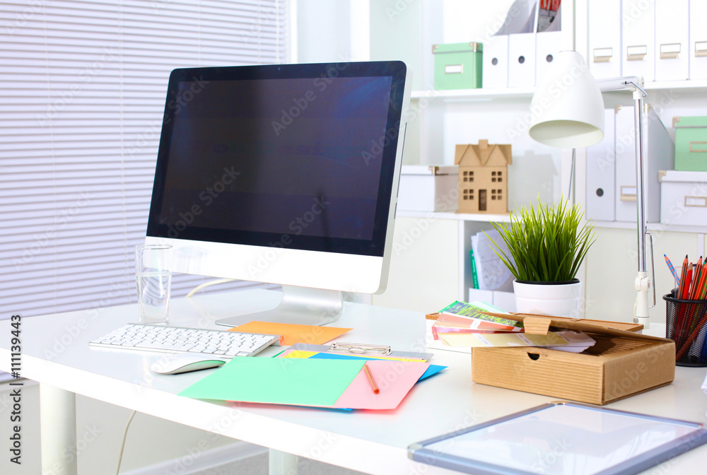Fototapeta premium Office workplace with laptop and smart phone on wood table