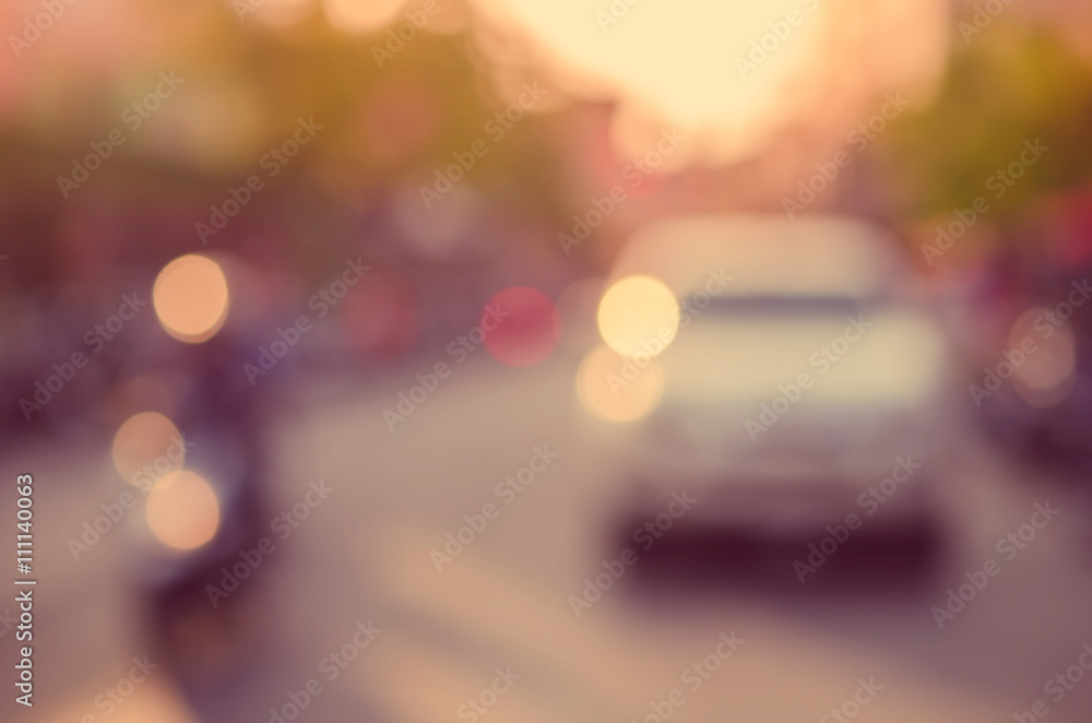 Blur traffic road with bokeh light abstract background.