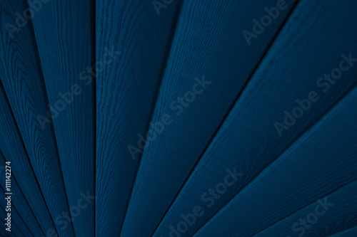 Deep blue wooden background. Diagonal boards. Wood texture.