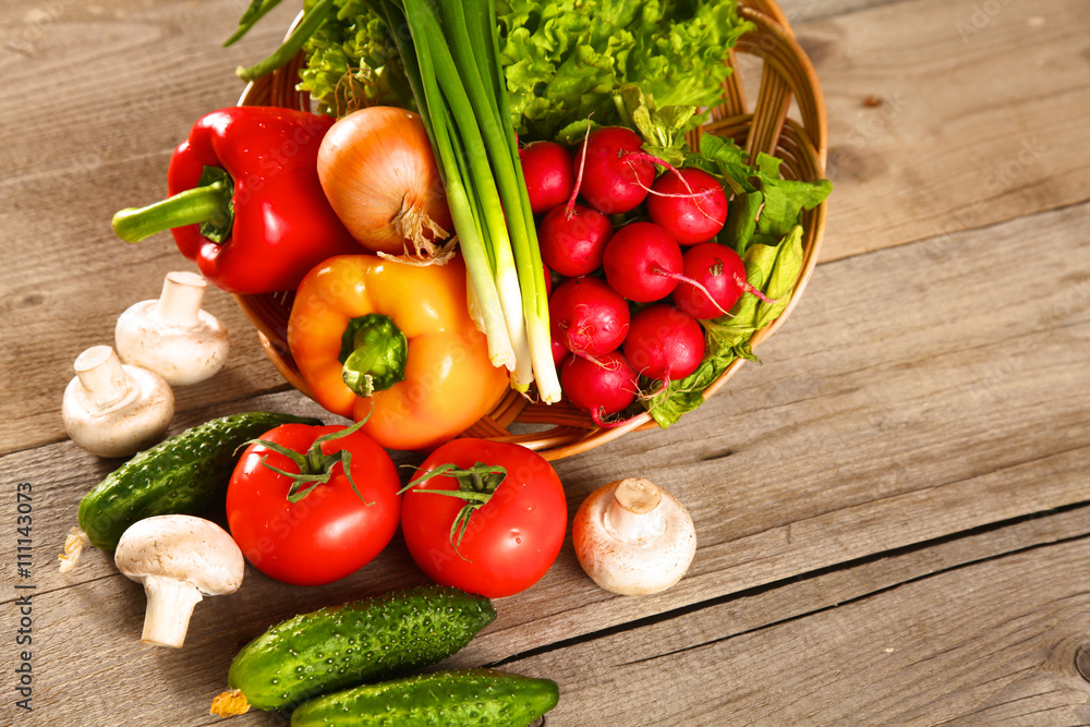 Vegetables . Fresh Bio Vegetable in a Basket. Over Nature Background Vegetables . Fresh Bio Vegetable in a Basket. Over Nature Background