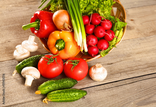 Vegetables . Fresh Bio Vegetable in a Basket. Over Nature Background