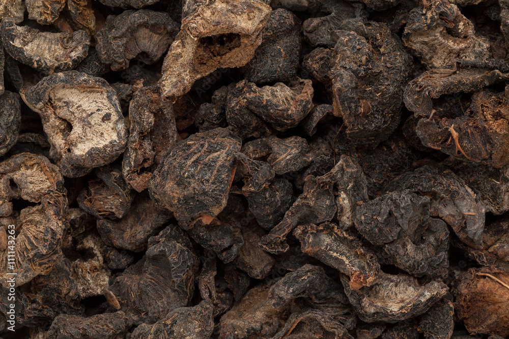 Organic dried Indian gooseberry (Phyllanthus emblica). Macro close up background texture. Top view. Organic dried Indian gooseberry (Phyllanthus emblica). Macro close up background texture. Top view.