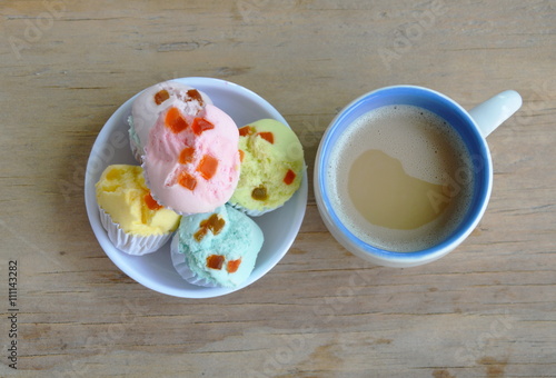 colorful cotton wool cake on cup and coffee