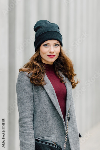 Woman standing on the street with blur background