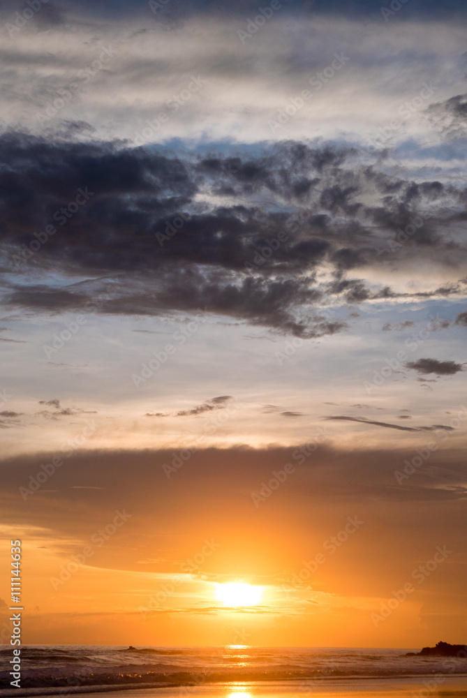 Fototapeta premium Colored sunset at Balian beach, Bali, Indonesia