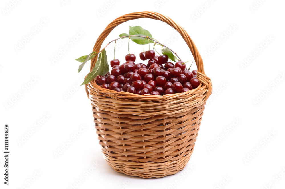 Basket full of fresh red cherry on a white background Basket full of fresh red cherry on a white background
