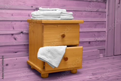 chest of drawers with a clean towel