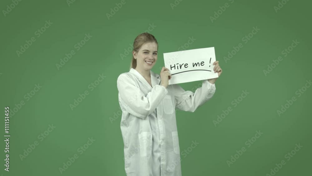 attractive caucasian girl with lab coat isolated on green unemployed with sign attractive caucasian girl with lab coat isolated on green unemployed with sign