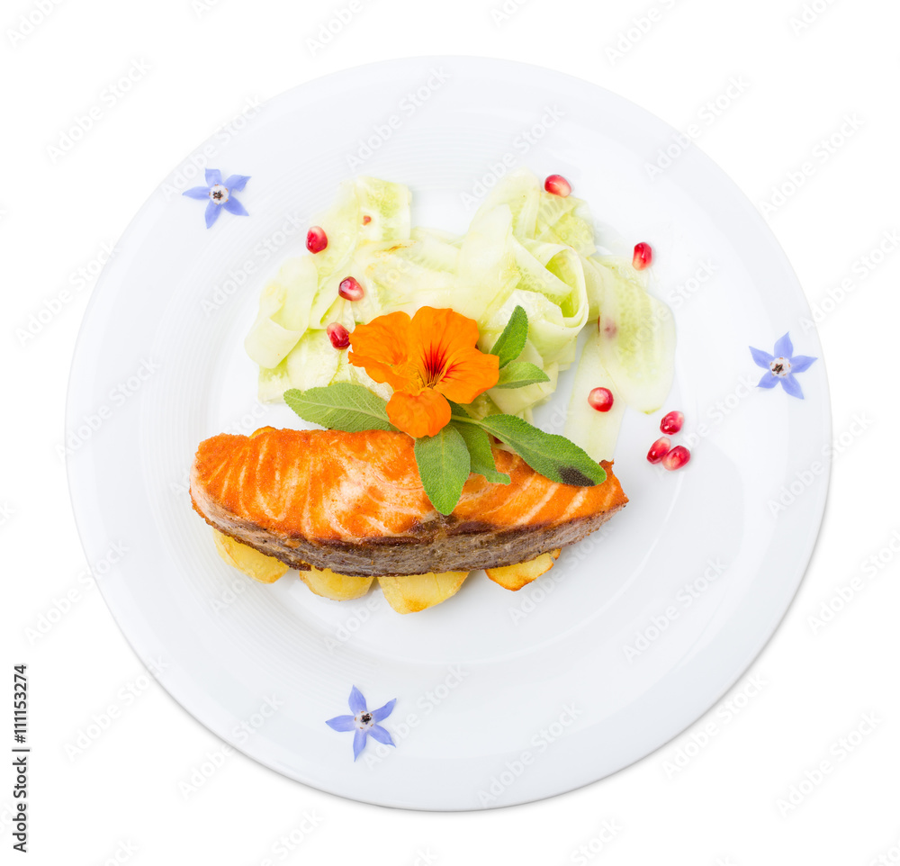 Grilled salmon fillet with sliced cucumbers. Grilled salmon fillet with sliced cucumbers.