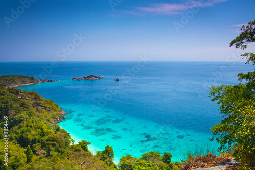 Beach and tropical sea sailing ship