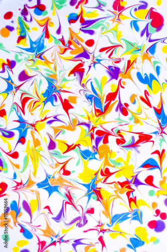Colorful abstract acrylic painting. Natural dynamic mixture of oil colored pigments fluid flow background.