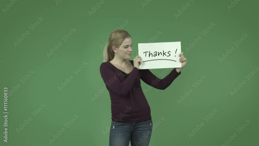 attractive casual caucasian girl isolated on green grateful with thanks sign attractive casual caucasian girl isolated on green grateful with thanks sign
