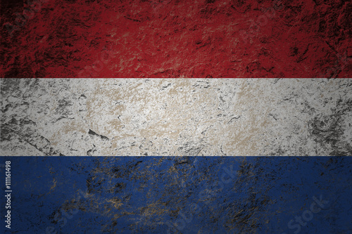 grunge flag of Netherland on stone background