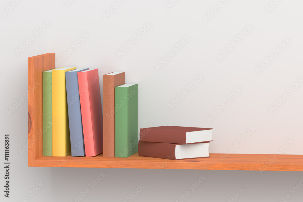 Fototapeta premium Colored books on wooden bookshelf on white wall