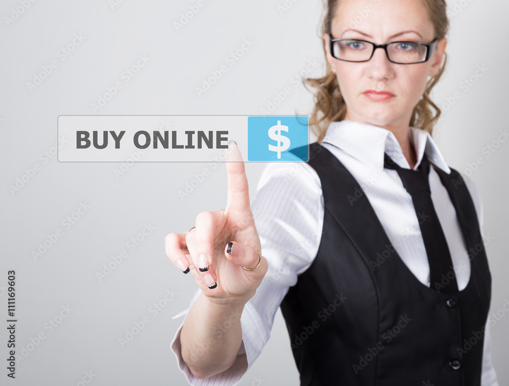 technology, internet and networking concept. beautiful woman in a black business shirt. woman presses buy online button on virtual screens technology, internet and networking concept. beautiful woman in a black business shirt. woman presses buy online button on virtual screens