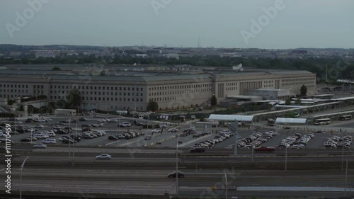 The Pentagon building and busy highway during overcast day in Washington DC, USA.
