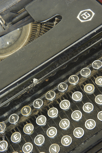 Antique Typewriter. Vintage Typewriter Machine Closeup Photo. © Petr Bonek
