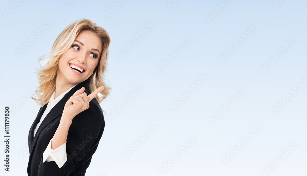 businesswoman, showing something or copyspace businesswoman, showing something or copyspace