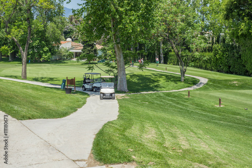 Golf cars at golf course